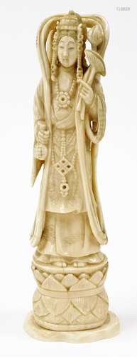 A Japanese marine ivory okimono, of the Goddess of Mercy, Ka...