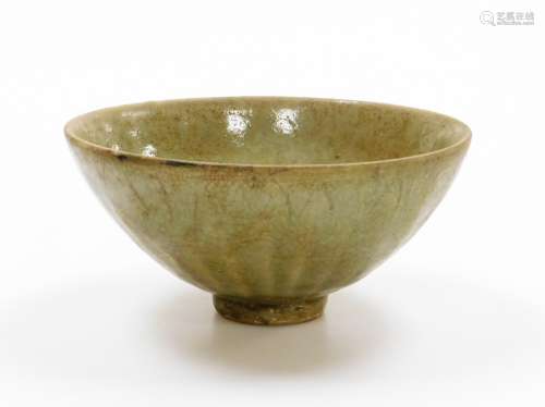 A Chinese longquan celadon bowl with lappet design to exteri...
