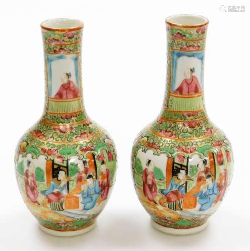 A pair of 19thC Chinese Canton porcelain bottle vases, with ...