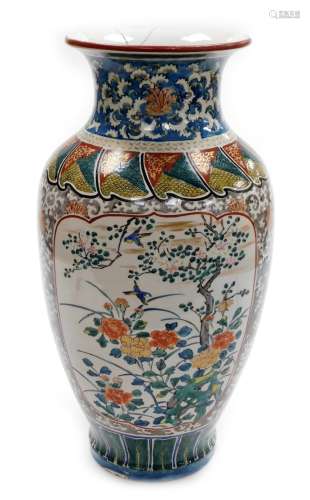 A large Japanese Kutani baluster vase, the panels of birds a...