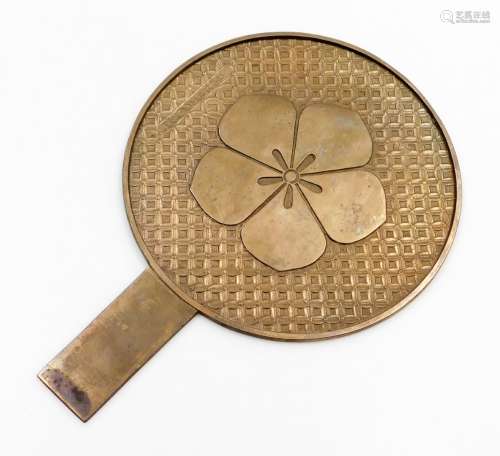 A Chinese bronze mirror, with five petal prunus blossom mon ...