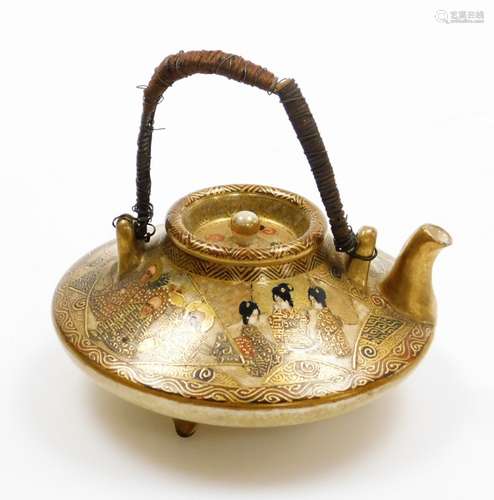 A Japanese Satsuma miniature sake pot and cover, decorated w...