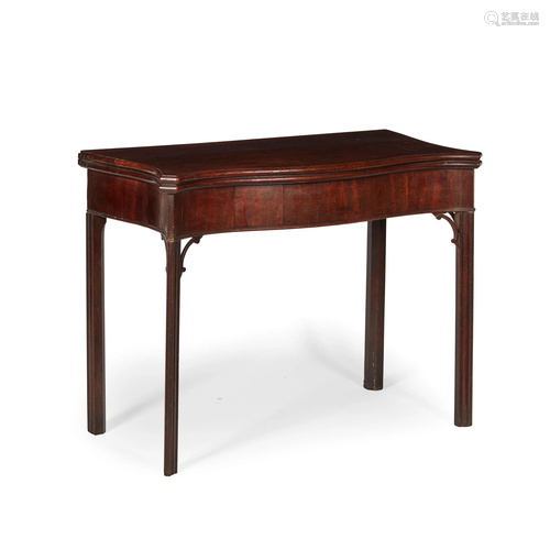 GEORGE III MAHOGANY FOLD-OVER SERPENTINE CARD TABLE…