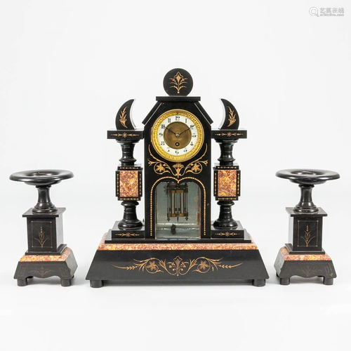 A 3 piece garniture clock made of black marble with