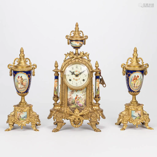 A three piece garniture clock made of bronze with