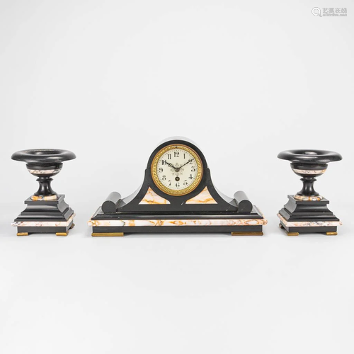 A three piece garniture clock made of marble and