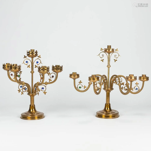 A collection of 2 neogothic style candelabra, decorated