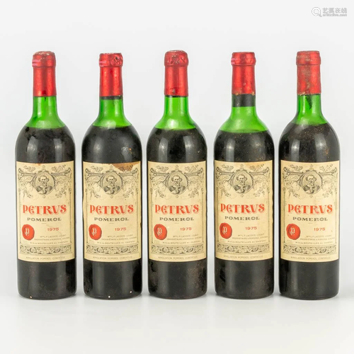 A collection of 5 bottles of Chateau Petrus 1975.