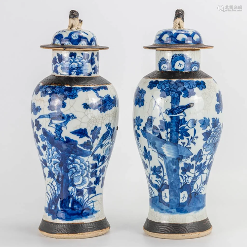 A pair of blue white 'Nanking' display vases made of