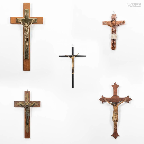 A collection of 5 large crucifixes.