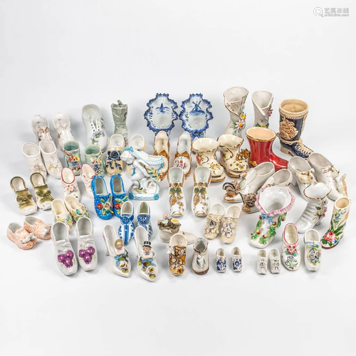 A large collection of porcelain shoes, from the