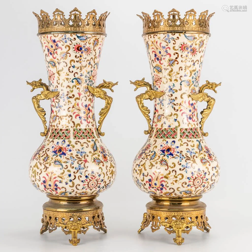 A pair of bronze mounted faience vases marked J.