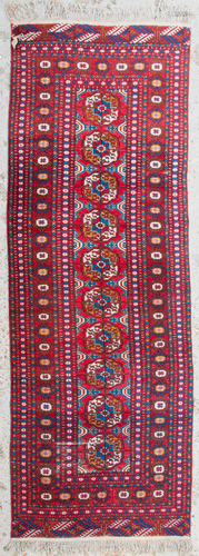 An Oriental hand-made carpet runner. Bokhara /