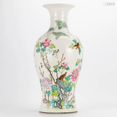 A Chinese vase with decor of peonies and birds.