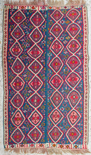 An Oriental hand-made Kilim.