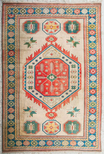 An Oriental hand-made carpet.