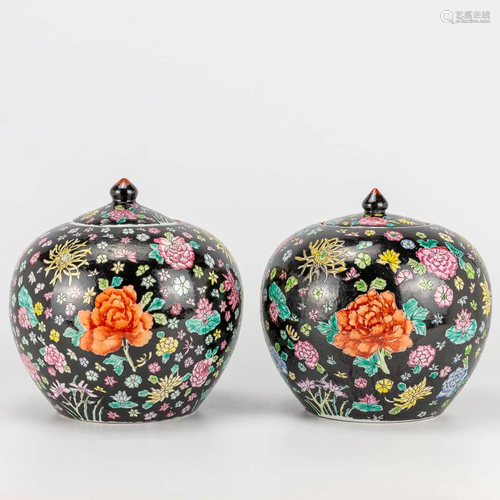 A pair of famille noir Chinese porcelain jars with lid,