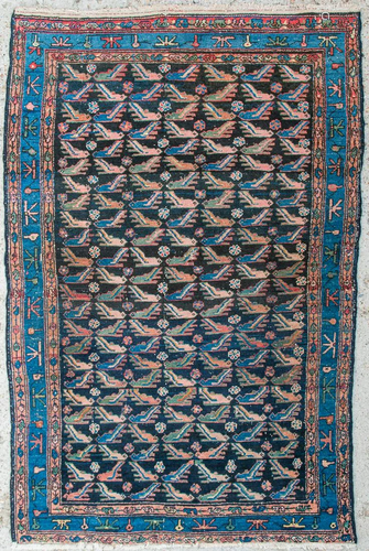 An Oriental hand-made carpet.