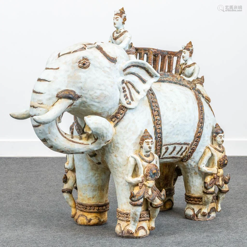 A ceramic statue of an elephant, probably made in