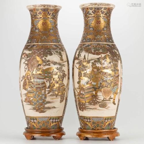 A pair of Japanese Satsuma vases with decor of warriors