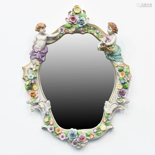 A mirror with putti made of porcelain in Plau, Germany