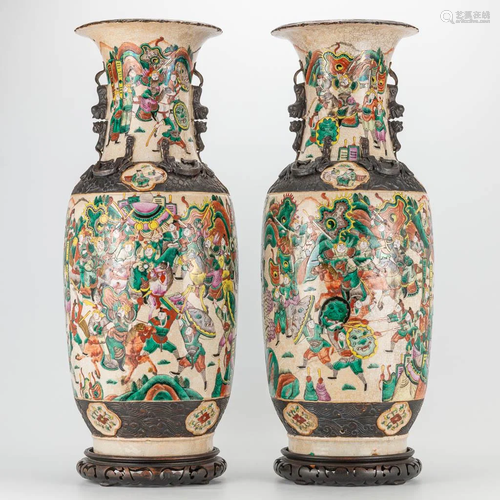 A pair of large Nanking Chinese vases with decor of