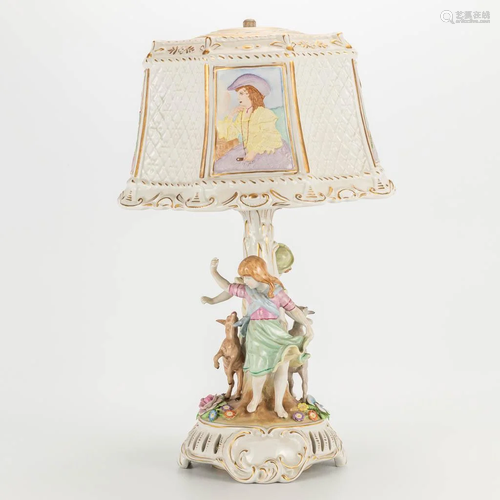 A porcelain table lamp with hand-painted decors and