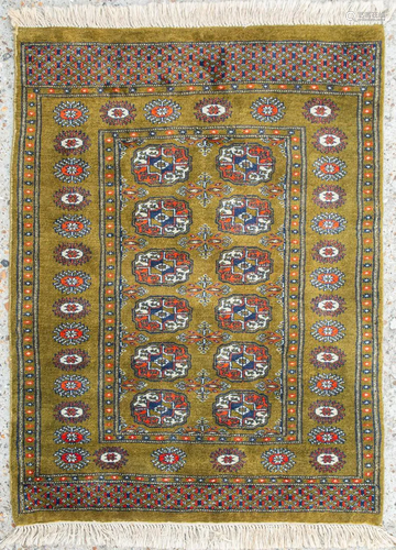 An Oriental hand-made carpet. Bokhara / Turkaman.