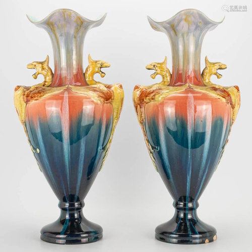 A pair of faience vases with dragon figurines in the