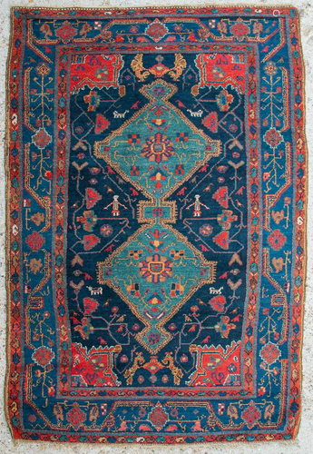 An Oriental hand-made carpet. Hamadan.