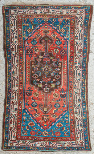 An Oriental hand-made carpet.