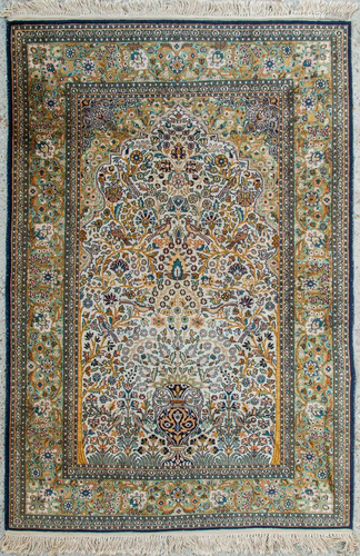 An Oriental hand-made carpet. Kachan with decor of