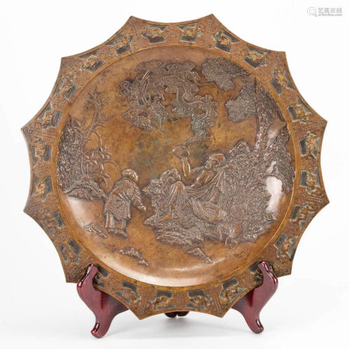 A display plate made of bronze, of Japanese origin.