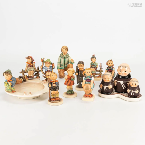 A collection of 11 Hummel porcelain statues.