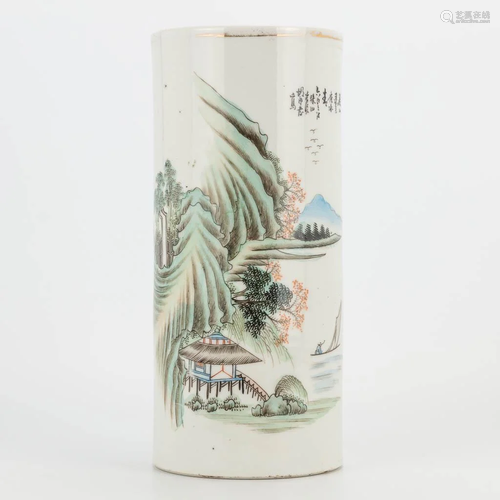 A Chinese porcelain hat stand with decor of mountain