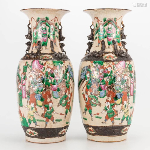 A pair of Nanking Chinese porcelain vases.