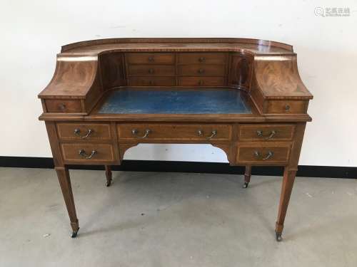 An Edwardian mahogany Carlton House desk, of typical form wi...