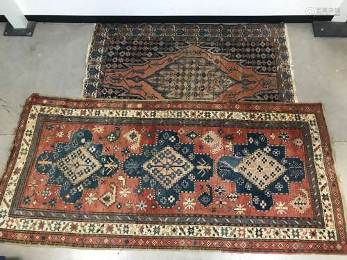 Two 20th Century middle eastern carpets, Including a flatwea...