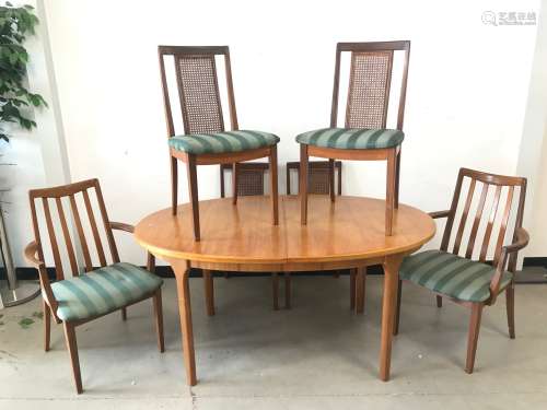 A 1970s teak extending dining table from Furniture By McInto...