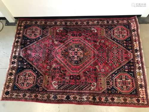 A vintage middle eastern woollen carpet, Sizes 282cm by 190 ...