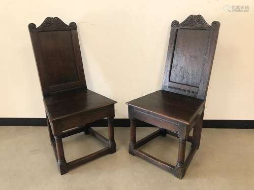 A pair of Victorian oak hall chairs, in the form of 17th cen...