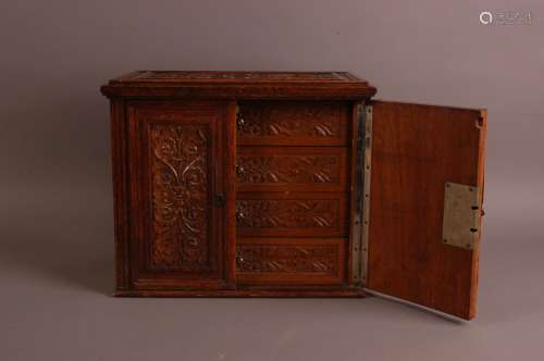 An early 20th century carved oak small chest of drawers, 40c...