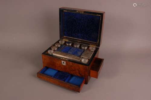 A Victorian walnut travel dressing set, 30cm wide, with cont...