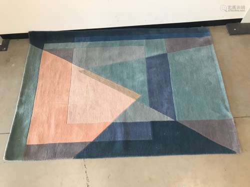 A modern woollen carpet by Pyramid, 226 cm by 158 cm