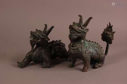 Two first half 20th century Chinese bronze mythical creature...