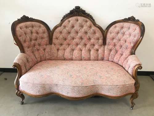 A Victorian period continental carved walnut three seater so...