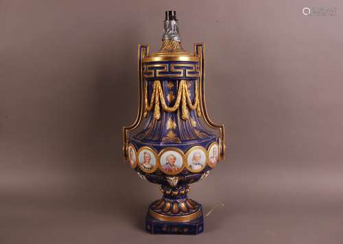 A late 19th century French porcelain lamp base, AF, unfortun...