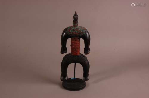 A first half 20th century African tribal wooden carving of a...