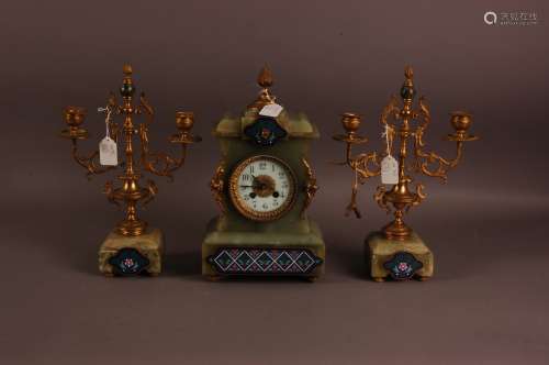 An early 20th century French onyx and gilt clock and garnitu...