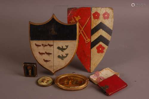 A small group of collectables, including a wooden and a meta...